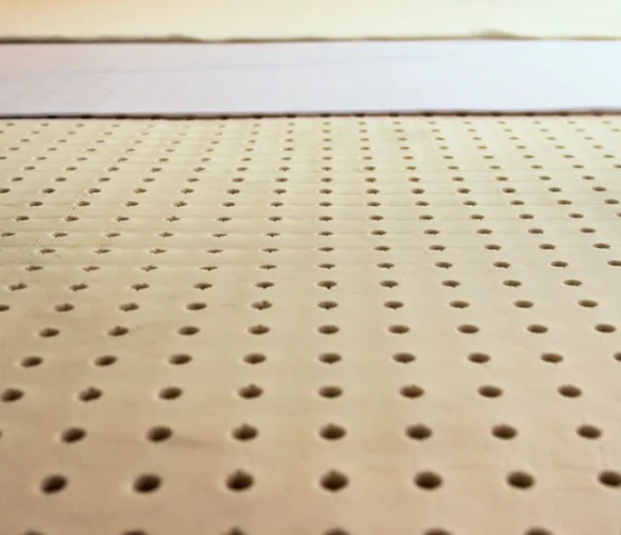 Surface texturée d'un surmatelas en latex naturel.